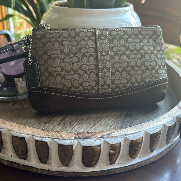 Coach Handbags - Brown Coach Logo and Suede Wristlet